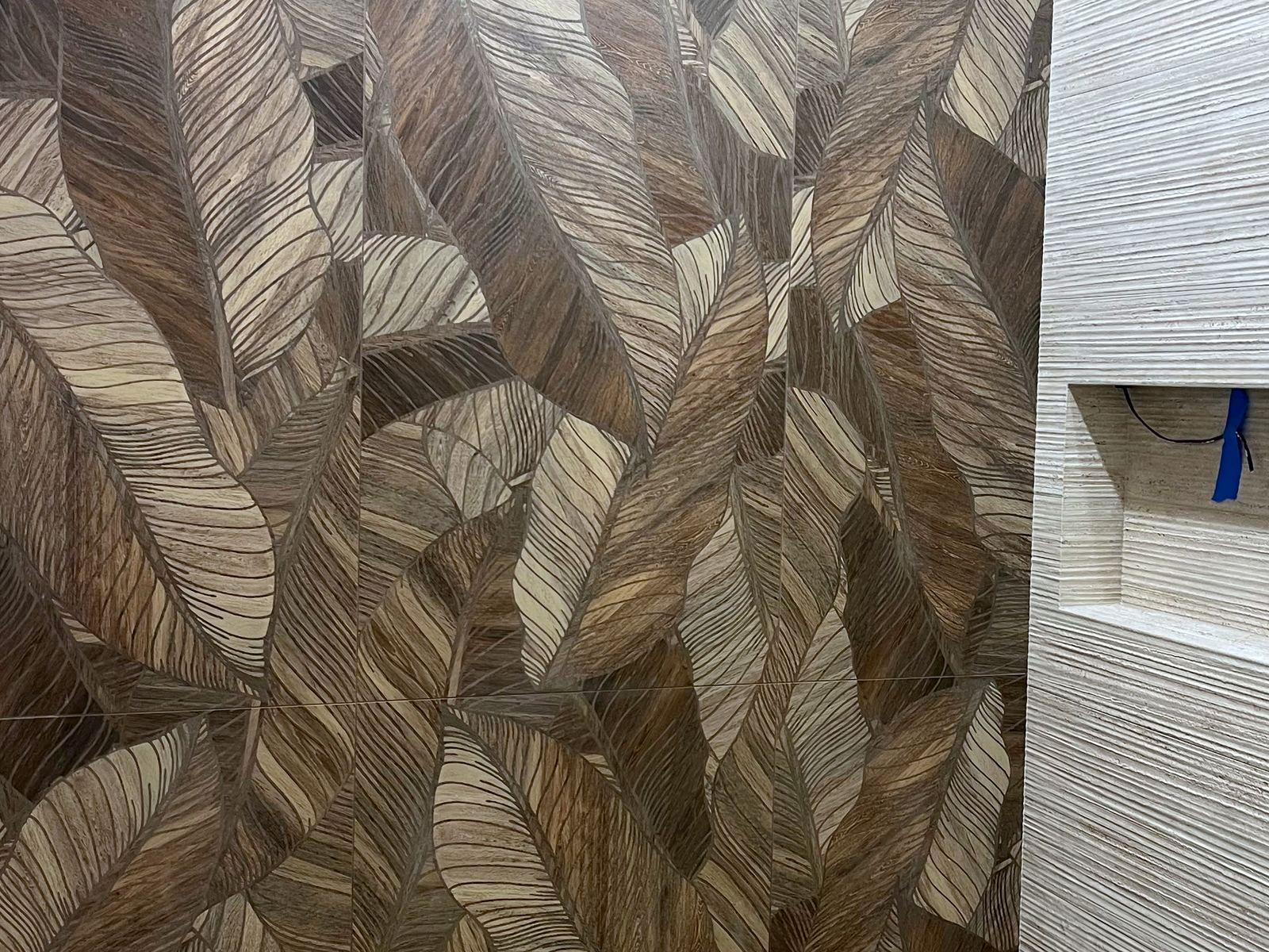 Feature shower wall in patterned porcelain tile, laid by a local pro